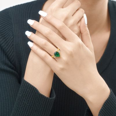 Emerald Pear Three-stone Ring